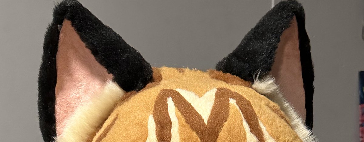 DTTDstudios's tweet photo. UwU whats this??? I just finished my latest project 👀 It’s only my 3rd fully finished head and the first one I’m actually really proud of 

Can’t wait to get photos of the full mini partial at #MFF

(Made on a @stuffedpanda base) 
#furry #fursuit #fursuitmaker #furries #fursuits https://t.co/FBtSL9gFlZ