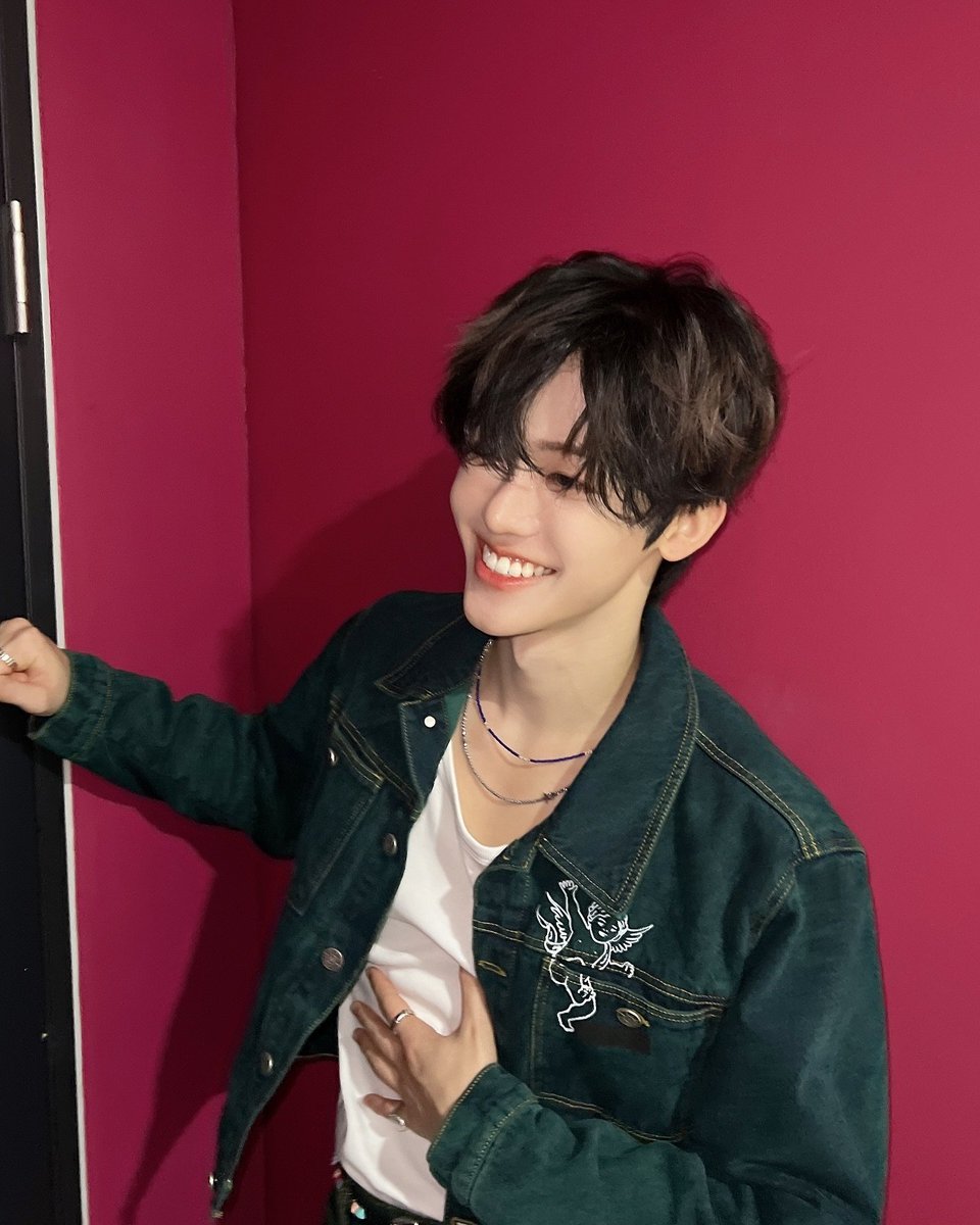 A playful grin sneaks in here. It’s not all about the serious poses—sometimes, the best moments are when you let go. The candid energy of the shot gives it an entirely different feel, like you’ve walked into a private joke.