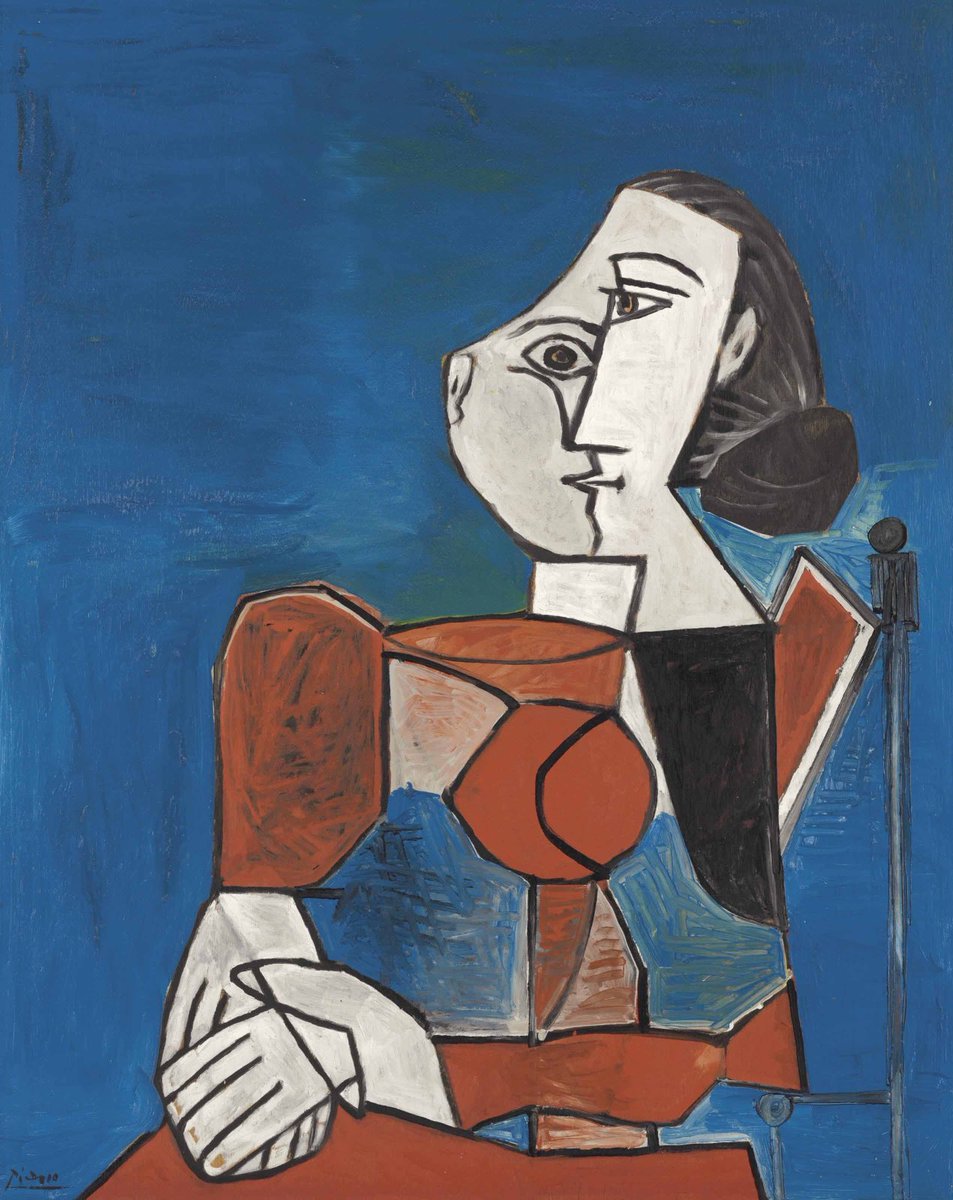 This is portrait of Françoise Gilot who had presided in Picasso's life for the previous seven years as mistress, ‘muse’ and the mother of their children Claude and Paloma.

Femme assise en costume rouge sur fond bleu painting by Pablo Picasso (1953).