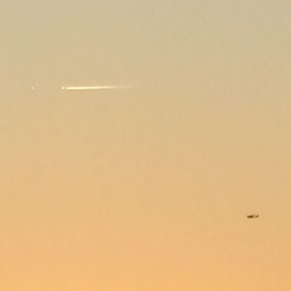 jaguarjulie's tweet image. Pretty sunset last evening at 5:26pm in Central Florida. I noticed a vapor trail and something flying parallel to that trail ... I have zoomed in on the second photo ... what do you think it is?? #whatisit