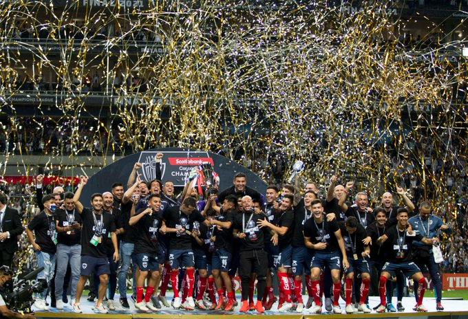CF Monterrey celebrate with the Concacaf Champions League trophy.