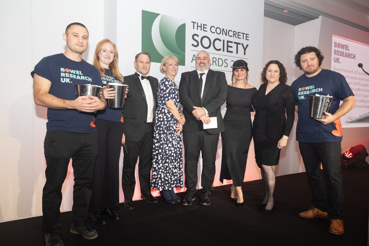 ukConcrete's tweet photo. The Society would like to thank guests at the recent Concrete Society Awards Dinner, whose generous donations to charity @BowelResearch  raised a fantastic £5000. Below: Society CEO Claire Ackerman, Bowel Research chief exec Lindsay Easton, staff &amp; draw winners at the event. https://t.co/pLXXqFp2Vr