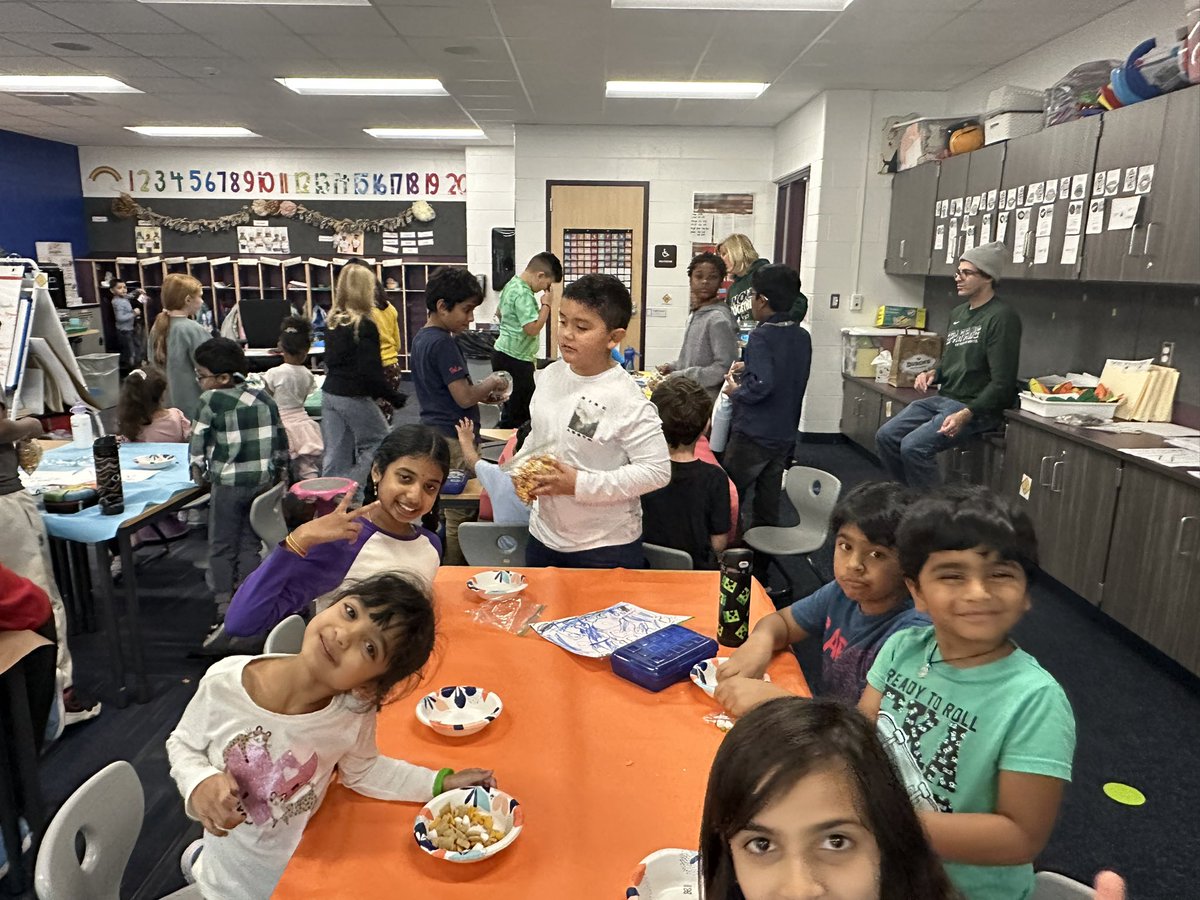 Mr. W-H’s 4th graders having Friendsgiving with Ms. Allerton’s kinders! Reading and snacks! <a href="/NCSD/">Novi Community School District</a>
