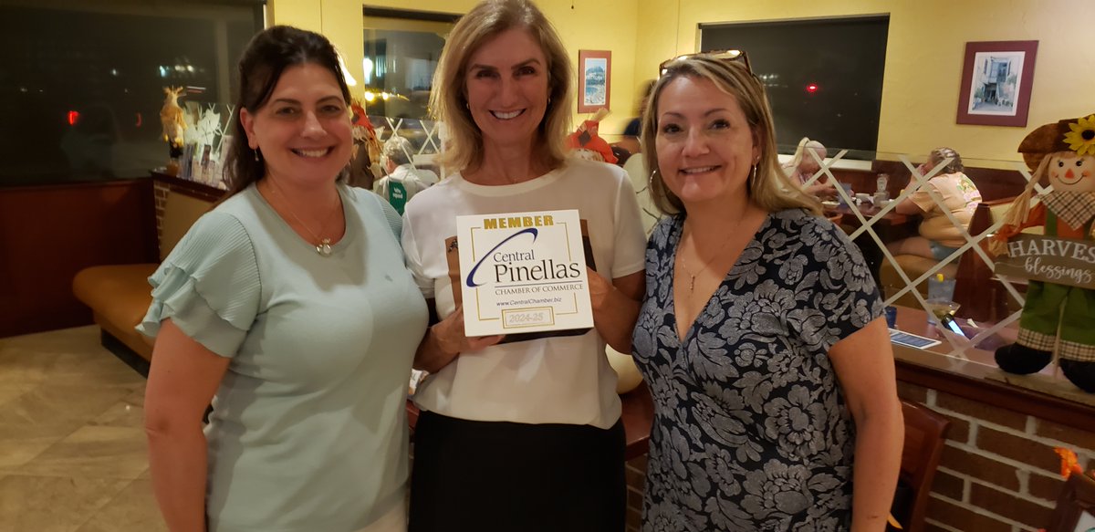 Magda Bruning owner of Maggie's Maids was presented with her official Chamber membership plaque by Chamber Director, Karen Gonzalez of Business &amp; Family Insurors Largo and Ambassador, Rosemary DePasque of Belleair Bluffs Chiropractic.