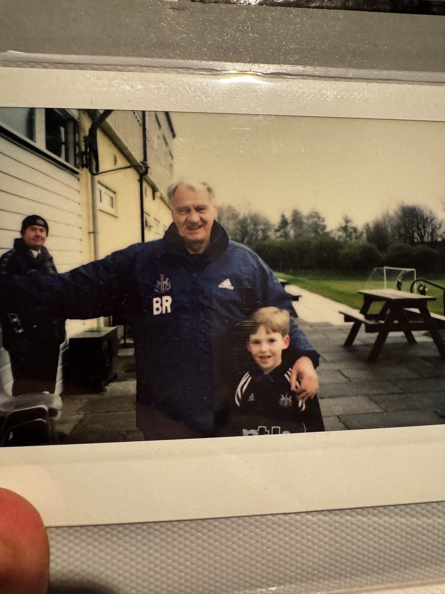 SHAMBAS_'s tweet image. Just found an old photo book. Fucking belta. Two of the big lads no longer with us. I have Speedo’s signed shirt from a 1-0 Derby game in ‘01 where I was ball-boy so getting that framed. Can’t wait! 

And who knew I’d chore @warrenbarton2 curtain haircut 20 year later 😂 #NUFC