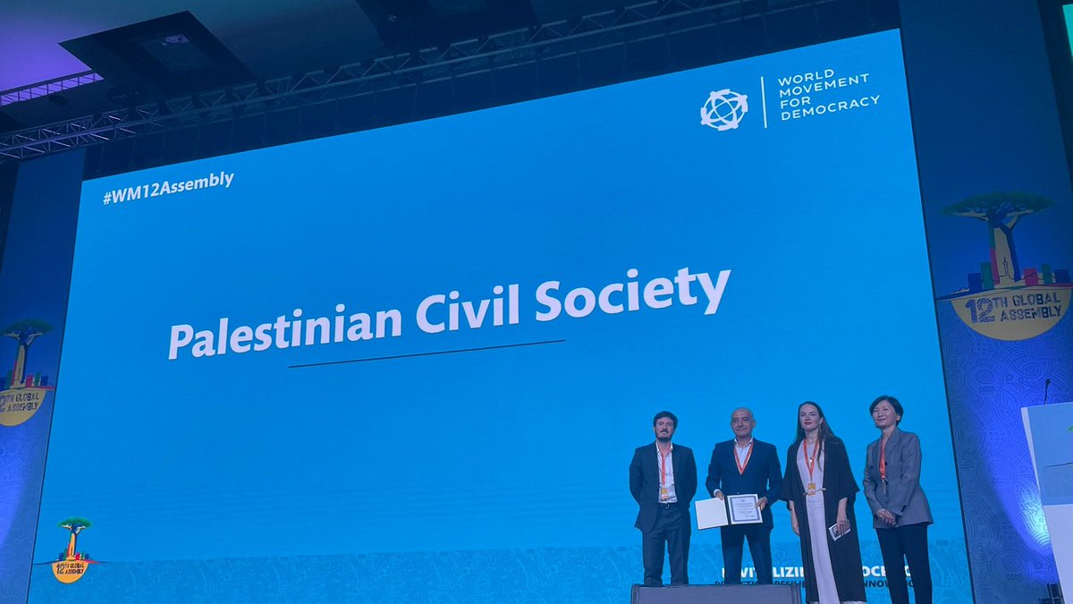 MoveDemocracy's tweet photo. 2024 Democracy Courage Tribute to Palestinian Civil Society. Presented by @MoveDemocracy’s Steering Committee member @avalaina. Received by @omarthinkof @PalThink. #WM12Assembly https://t.co/3gjabg00HG