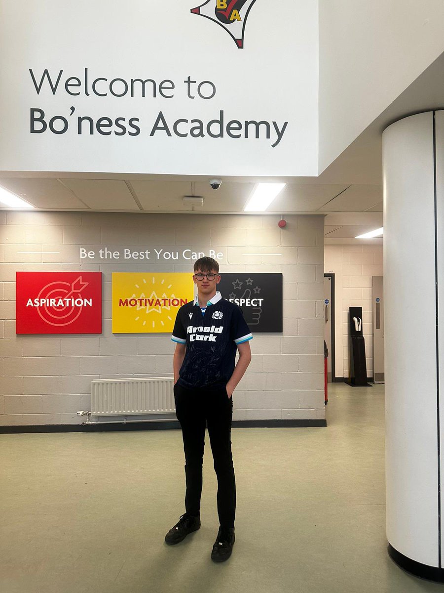 Boness_Academy's tweet photo. R modelling our signed Scotland top from the Autumn Internationals!! Fantastic raffle prize - ideal gift for Christmas! Tickets £1 - available at the Christmas Fayre tomorrow or from the school office next week! https://t.co/BFdNcBSUeb