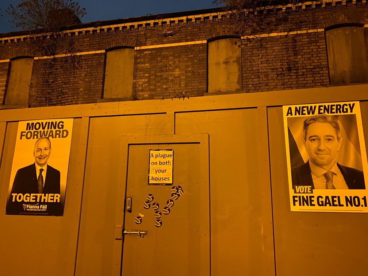 Hoarding on the decades derelict houses on Connaught St.  You gotta love Phibsboreans! <a href="/FineGael/">Fine Gael</a> <a href="/fiannafailparty/">Fianna Fáil</a> <a href="/SimonHarrisTD/">Simon Harris TD</a> <a href="/MichealMartinTD/">Micheál Martin</a> <a href="/Paschald/">Paschal Donohoe</a> <a href="/votemaryfitz/">Senator Mary Fitzpatrick</a> #whodunnit