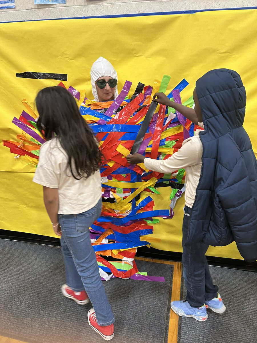 Today we celebrated our students who raised $24,000 to support our school! Celebrations included prize winners, a pizza party, and taping Mrs Dinkelmann to the wall!