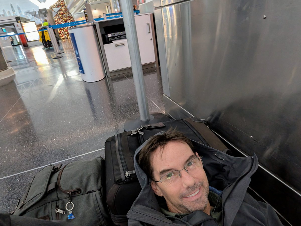 bobreideverest's tweet photo. The inglorious part of travel.... When you get bumped off your flight from Italy to California, and have a 5-hour layover at JFK starting at midnight. 40 hours to get home, via cold floor nap at chateau JFK and three other airports. Made it in time for a 1:30 pt zoom call. 😀 https://t.co/HiqQvQtkXw