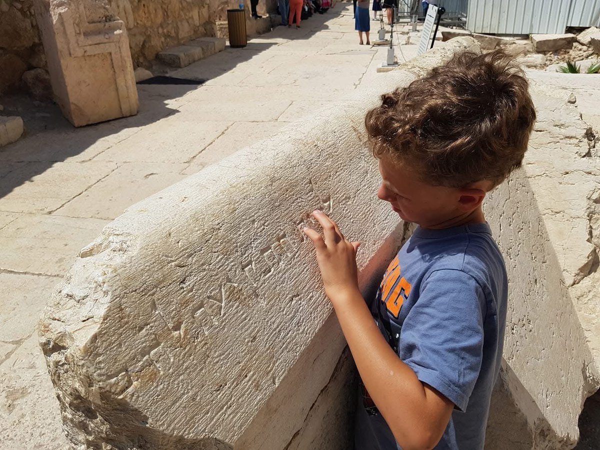 “My son. He's not a PhD expert archeologist for decoding ancient languages. He's an 8 year old boy, reading plain Hebrew text etched in the 2nd Temple's stone more than 2000 years ago by one of his ancestors.

That's a few years before Jesus was born. And more than 600 years