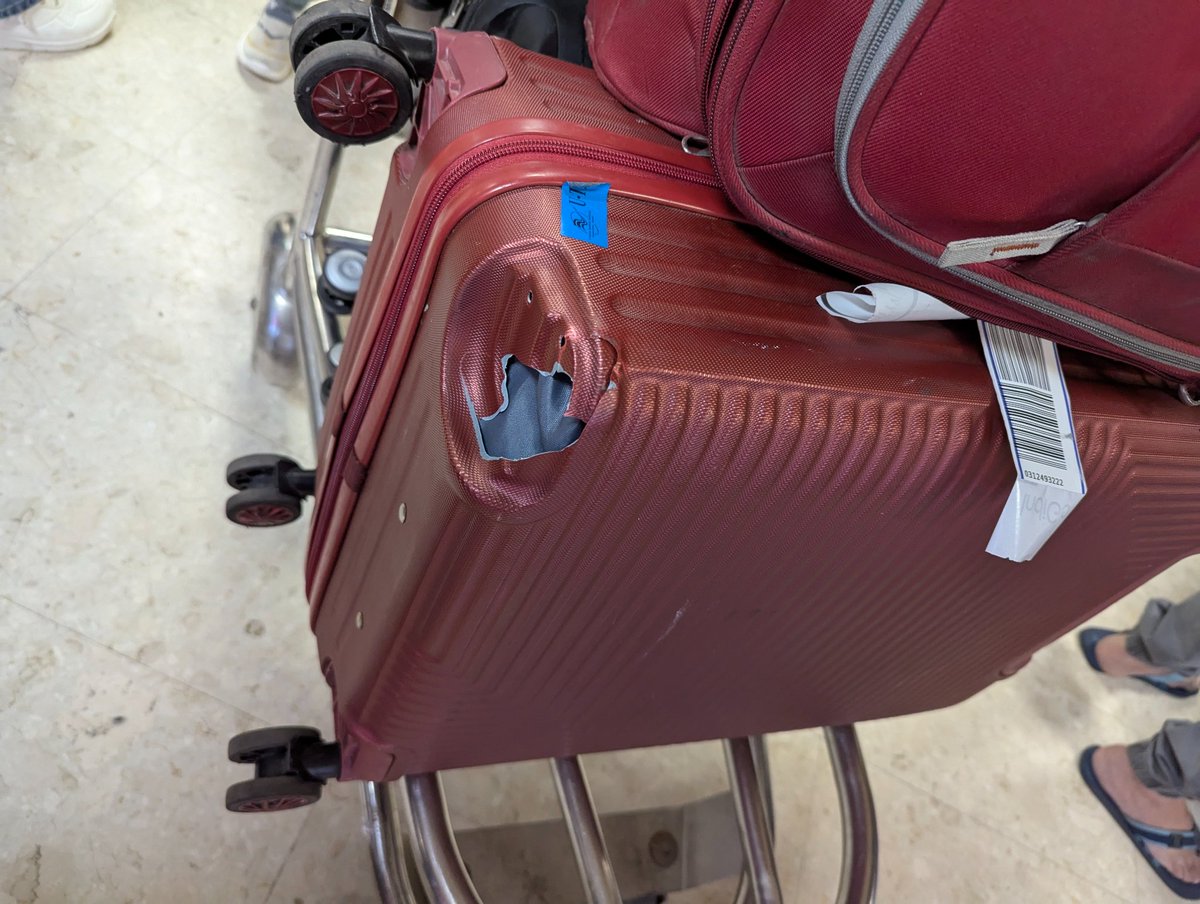Abhimankokate's tweet photo. @IndiGo6E our bag got damaged while handling by the airline. We saw it while we left from Colombo Airport. What's the procedure to claim it as we are on the way to our destination. https://t.co/ACWkjNdbgm