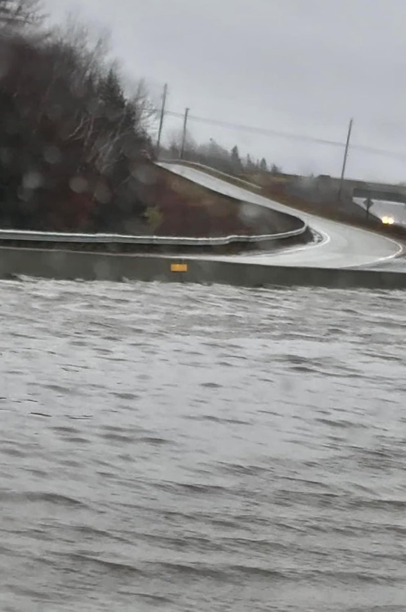 KyleMooreCB's tweet photo. Part of highway 125 in Sydney is flooded. RCMP are on scene. https://t.co/5fyrTUKKrO
