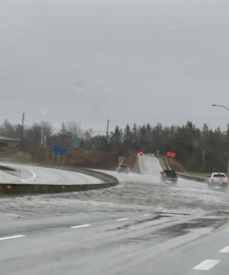 KyleMooreCB's tweet photo. Part of highway 125 in Sydney is flooded. RCMP are on scene. https://t.co/5fyrTUKKrO