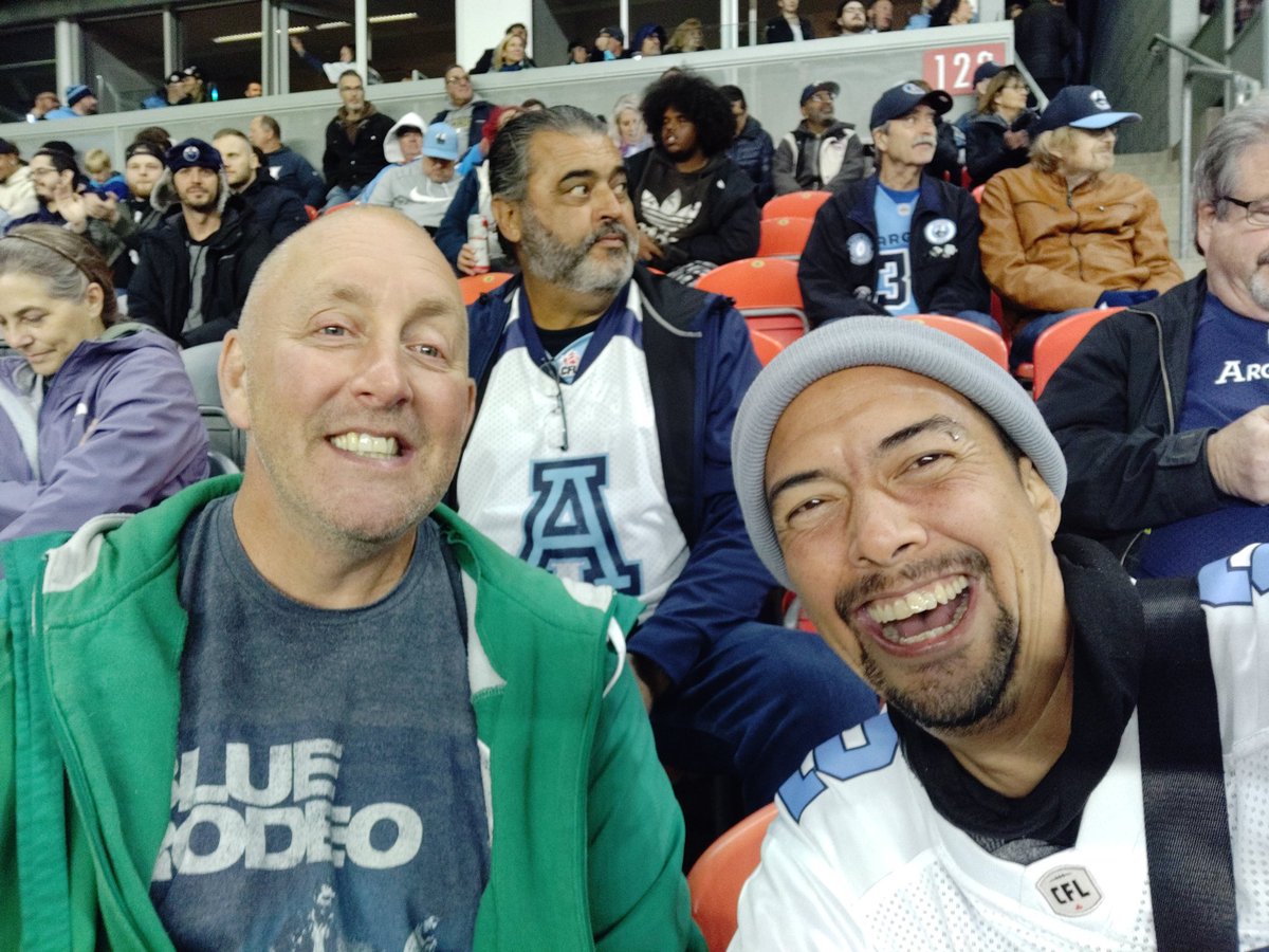 CFLFansToronto's tweet photo. Deserves a longer post...

#Argos/#CFLFamily old and new,
We've got a great crew in Sec 122, halfway up, rows ~11-13 at the midfield end (seat 28, 30 yardline). We have a blast tailgating before (and often after 😁🍻) the games. If you're good vibes, come join us! https://t.co/0xMqzDDCfj