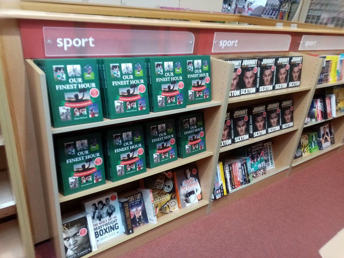 Things I didn't expect to be doing in 2024 ... Sharing shelf-space with <a href="/JohnnySexton/">Johnny Sexton</a> and the front window of the bookshop with Johnny and Sally Rooney! Séimí doesn't look overly amazed though!

Book Stand in Castlebar. Signed copies inside.