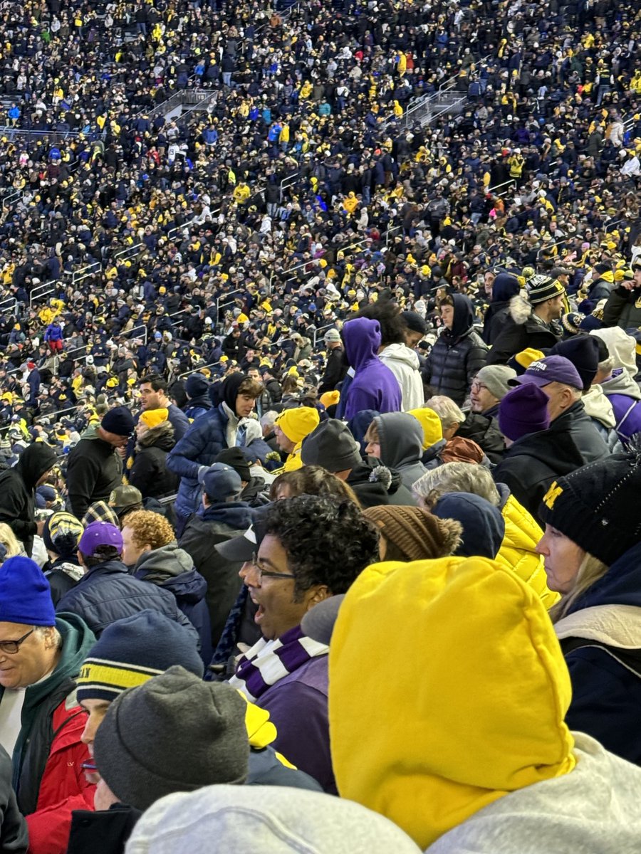 sbloomfield15's tweet photo. I think this is the extent of my @NorthwesternU brethren I can find here in Ann Arbor for a chilly Big 10 (or 18) game! Spots of purple does not feel like enough to make a dent with @UMich fans! #dividedhouse https://t.co/XGKSPwHu3J