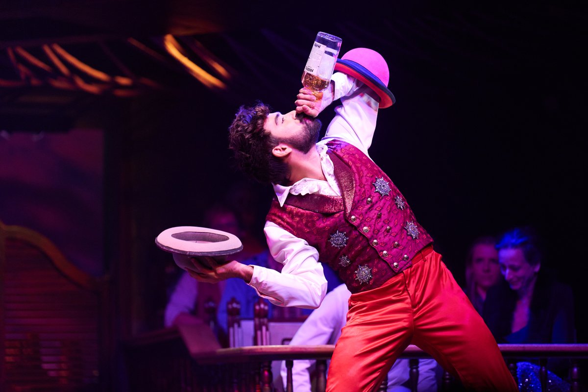 Chugging whiskey like it’s holy water—because sometimes the only way to cleanse the soul is with a little liquid salvation.