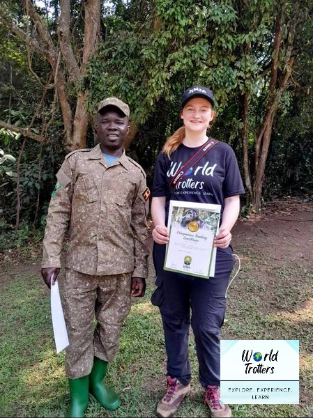 NatashaEpenu's tweet photo. After a successful chimpanzee trekking expedition, our guest received her chimpanzee tracking certificate. Many thanks to UWA for their guidance, right from permit acquisition, induction to the tracking experience. #WorldTrotters #KibaleNationalPark #ExploreUganda🇺🇬🇺🇬🇺🇬 https://t.co/YoEKoHvkYF