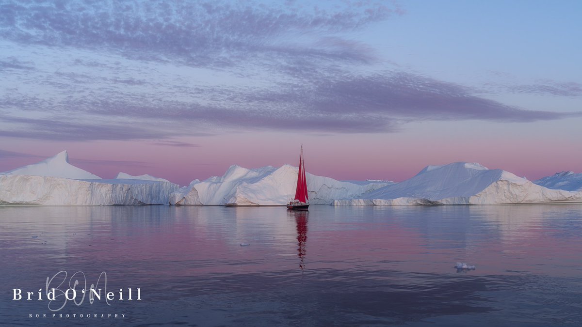 NeillBrid's tweet photo. Didn’t get a chance to get out to photograph the snowy, wintry conditions here last week. So had to make do with editing a shot from recent Greenland 🇬🇱 Trip.

#winteriscoming❄️ #winterishere❄️ #snow #ice #greenland #redsails #icebergs #BONPhotography https://t.co/mQGq5vHF09