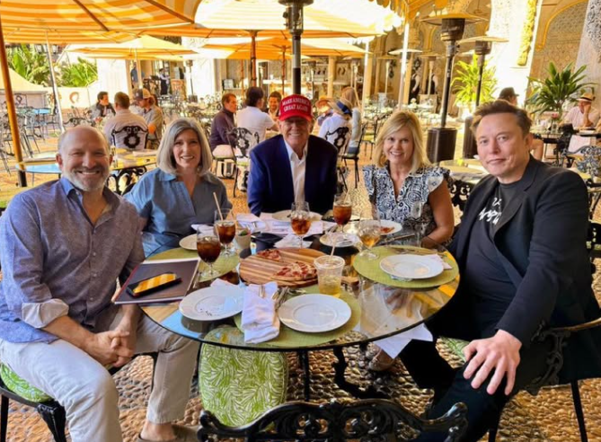 kekius_sol's tweet photo. Elon Musk with President Trump and friends at Mar-a-lago, Florida today. https://t.co/LLsZ6FYNOk