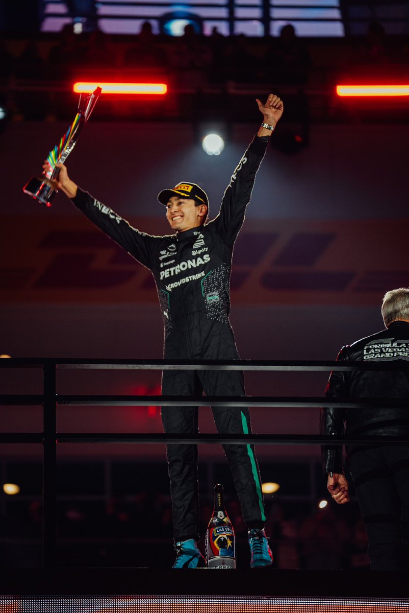 GeorgeRussell63's tweet photo. Winning in Vegas, what a moment!! A massive thank you to the whole team for your hard work all weekend, we deserved that 1-2. LET’S GO!!🍾🇺🇸 https://t.co/z4Rh7YWbgE