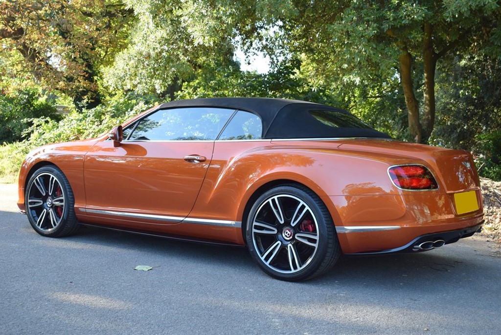 hanwellsnet's tweet photo. 2015/15 Bentley Continental GTC V8 S Convertible Mulliner Spec. in special order Orange Flame with Black roof and Beluga interior. Aluminium turned dash, ventilated front seats with massage, Audison stereo upgrade. Only 17,500 miles with FSH. Only £63,950 https://t.co/UHTYZ1NvRM https://t.co/P8ZdQlrqF4