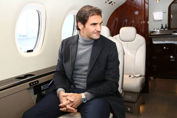 Staff member taking a photo of Me looking at another staff member responsible for pulling out My table on Fed Force One #yourefired