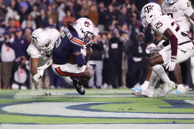 bijoooLive's tweet photo. KeAndre Lambert-Smith with a clutch performance in OT to seal Auburn's upset win over No. 15 Texas A&M! 💥 Two big catches, including the game-winning TD. This Penn State transfer is showing up big time! 🔥🐯 #AuburnFootball #KeAndreLambertSmith #GameWinner #CollegeFootball #SEC #AuburnTigers #Clutch