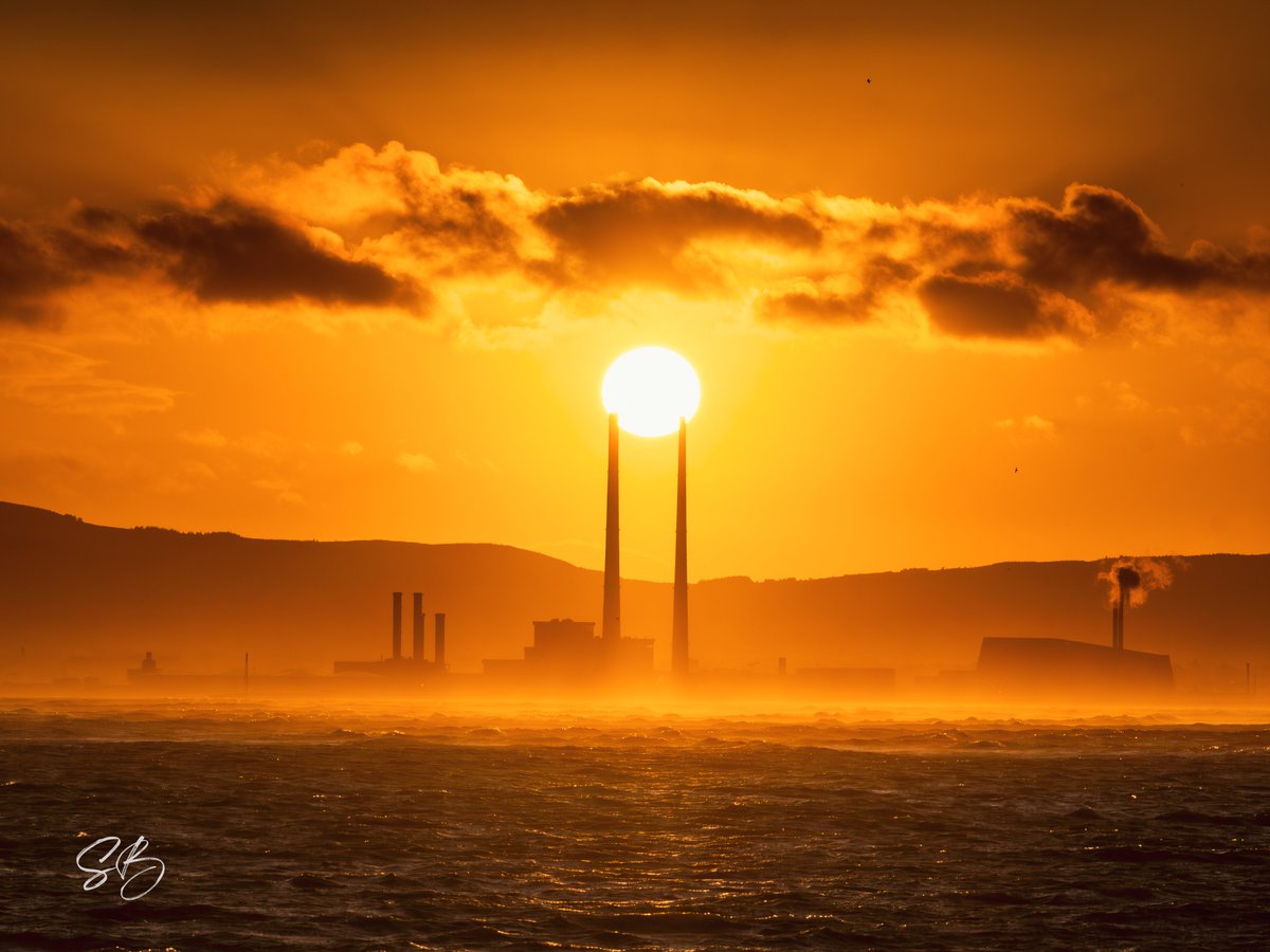Sunset over the Poolbeg Chimneys from Sutton Strand this evening.