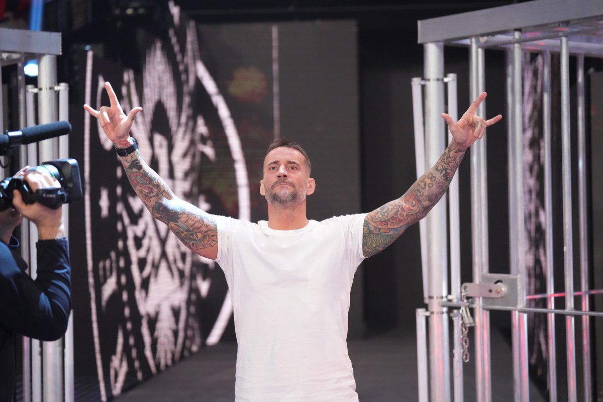 WWEAustralia's tweet photo. #CMPunk returned one year ago today! 

#SurvivorSeries https://t.co/P5t3C2C0OM