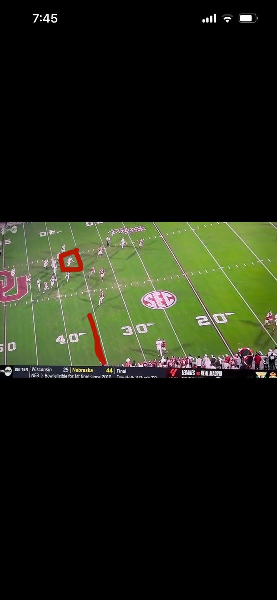 rcwhlr's tweet photo. @JohnQMilktoast @MalaFide77 @brenton__morris @treywallace Also he was behind the line of scrimmage when Milroe threw the ball.  He’s squared in red and the line at the bottom is the line of scrimmage https://t.co/J9AGrlevAl