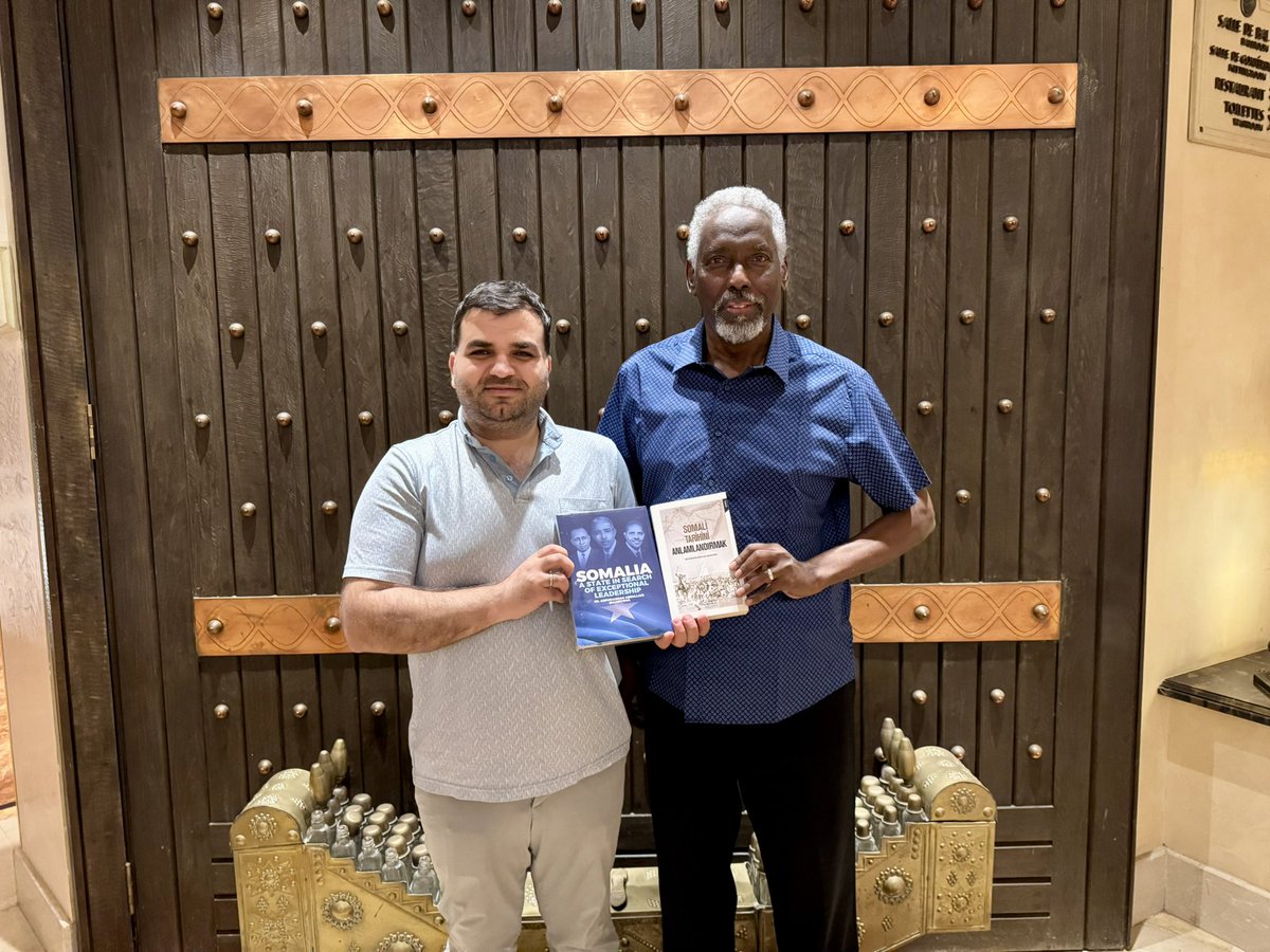 DemirciEbuzer's tweet photo. I am thrilled to announce the Turkish translation of Making Sense of Somali History, the two-volume masterpiece by one of Somalia’s foremost intellectuals, Dr. Abdurrahman Baadiyow. Published under the title Somali Tarihini Anlamlandırmak by Afrika Vakfı Publications, this work brings a fresh perspective to Somali history.

Somalia holds great significance for Türkiye, yet academic studies on the country often lag behind the depth of our political relations. I am confident that this insightful work will serve as a valuable resource for Turks interested in understanding Somalia’s complex history.

I had the honor of meeting Dr. Baadiyow in Djibouti during the Promoting Regional Stability: The Importance of Rules-Based Cooperation, Trade, and Peace in the Horn of Africa program hosted by the Heritage Institute at Palais du Peuple Djibouti. It was a privilege to present him with the first copies of the book’s Turkish edition.

I extend my heartfelt gratitude to Dr. Baadiyow for his unwavering support in making this project a reality.
…..

Somali’nin en önemli entelektüellerinden biri olan Dr. Abdurrahman Baadiyow’un iki ciltlik başyapıtı Making Sense of Somali History eserini Somali Tarihini Anlamlandırmak başlığıyla Türkçeye kazandırmanın mutluluğunu yaşıyorum. Bu eser, Afrika Vakfı Yayınları tarafından yayımlandı ve Somali tarihine yeni bir bakış açısı getiriyor.

Somali, Türkiye için oldukça önemli bir ülke olmasına rağmen, Somali üzerine yapılan akademik çalışmalar ne yazık ki siyasi ilişkilerimizin gerisinde kalıyor. Bu değerli eserin, Somali’nin tarihini anlamak isteyen Türk okuyucular için önemli bir kaynak olacağına inanıyorum.

Dr. Baadiyow ile Cibuti’de, Heritage Institute tarafından Palais du Peuple Djibouti’de düzenlenen Promoting Regional Stability: The Importance of Rules-Based Cooperation, Trade, and Peace in the Horn of Africa programı vesilesiyle bir araya geldik. Kendisine kitabının Türkçe baskısının ilk kopyalarını takdim etme onurunu yaşadım.

Bu projenin hayata geçmesindeki destekleri için Sayın Baadiyow’a içten teşekkürlerimi sunarım. @DrBaadiyow 

#AFI2024 #Djibouti #HeritageForum #RegionalCooperation #RegionalStability