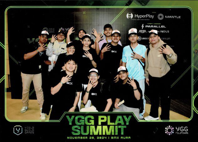 GM ☕️

Ready to grind P2A Season 2! Just look the hand sign maybe that's the alpha you're looking for 👀 Thanks to <a href="/TriballyGames/">Tribally 🎮</a> for the awesome merch, and it was great meeting <a href="/RareAxies/">Rare | Tribally 🛠</a> and @DyGunlocke in person! Safe travels guys! 🧡

 #YGGPlaySummit