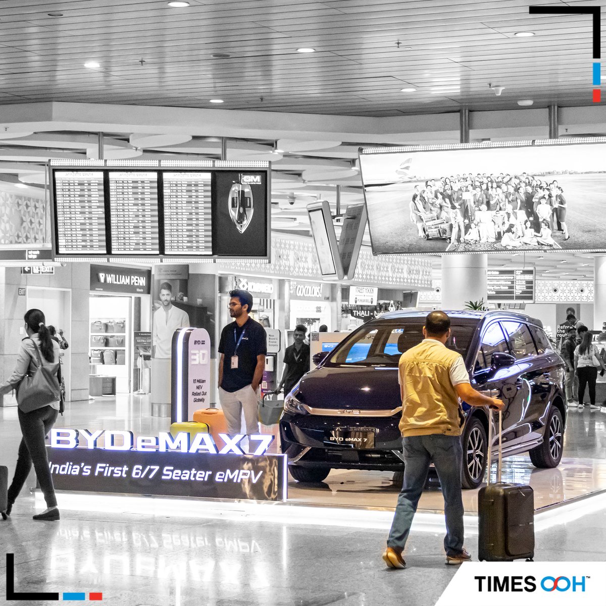 times_ooh's tweet photo. @BYDCompany showcases its sleek and stylish strategy with a striking #promodisplay of the #BYD #eMAX7 at #MumbaiAirport.Mumbai Airport perfectly aligns with the brand's target audience—professionals, aspirational individuals, affluent HNIs, &amp;NRIs. #TimesOOH #OOH https://t.co/NQ4DaahsdU