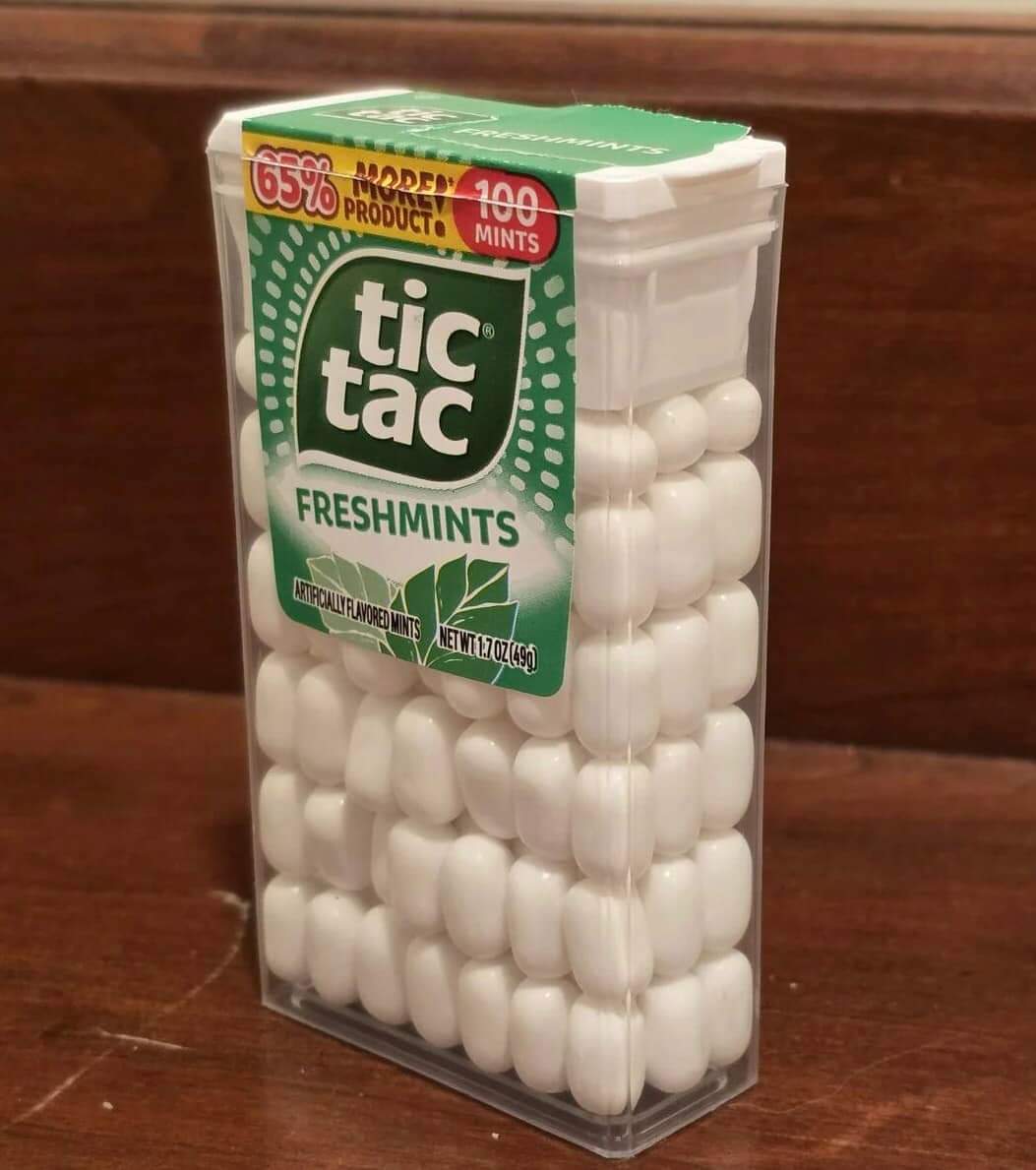 the___ivan's tweet image. I stacked 140 Tic Tacs into a container designed for 100.