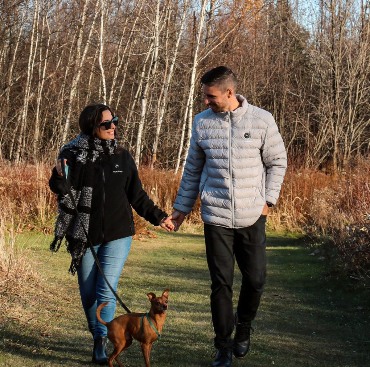 Crisp air, golden leaves, and endless warmth. 👫🐕🔥 

Featured:
Zipper up Heated Fleece Jacket for Women 7.4V
Men's Heated Lightweight Puffer Jacket 7.4V

Black Friday Sale: venustasofficial.com

#Venustas #HeatedJacket #VenustasSqaud #StayCozy #AdventureTogether