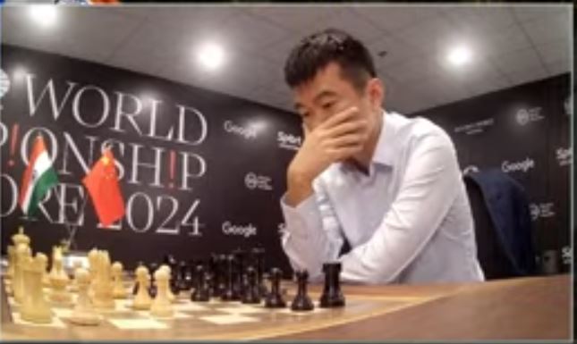 _Gonda_'s tweet photo. @ChessbaseIndia @DGukesh Gukesh wins because Ding has a facehugger on his face https://t.co/pAOwRwf2OW