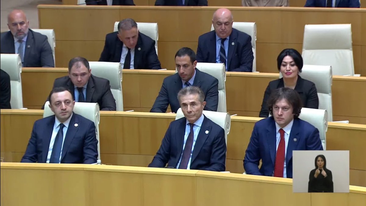 Look at the faces… not one believes they are acting in good faith.

Each one of them has been sanctioned by the international community, except for the three in front. That needs to change.