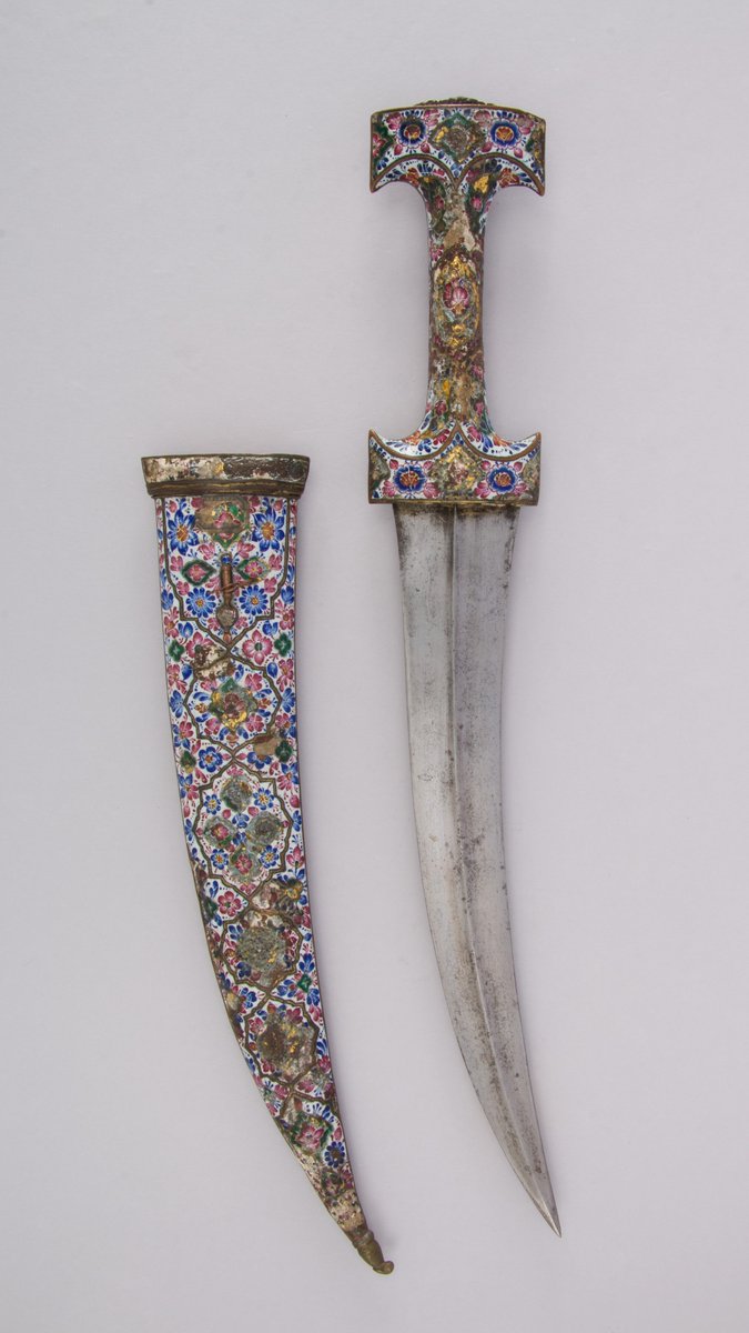 wikivictorian's tweet photo. Steel, copper, enamel, garnet and turquoise dagger (Jambiya) with sheath, early 19th century. Persia. The MET. https://t.co/IIsCtf4KeW