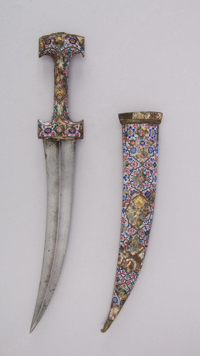 wikivictorian's tweet photo. Steel, copper, enamel, garnet and turquoise dagger (Jambiya) with sheath, early 19th century. Persia. The MET. https://t.co/IIsCtf4KeW