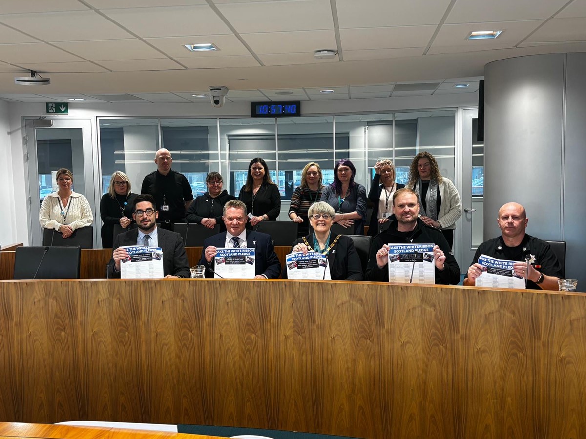 DACO_Prevention's tweet photo. Group Commander Colin McKenna visited @North_Ayrshire Headquarters today to sign a pledge supporting the 16 Days of Action campaign.

This campaign raises awareness and calls for action to end gender-based violence. Together, we stand united for a safer, more equal society. https://t.co/r79GYpeBYF