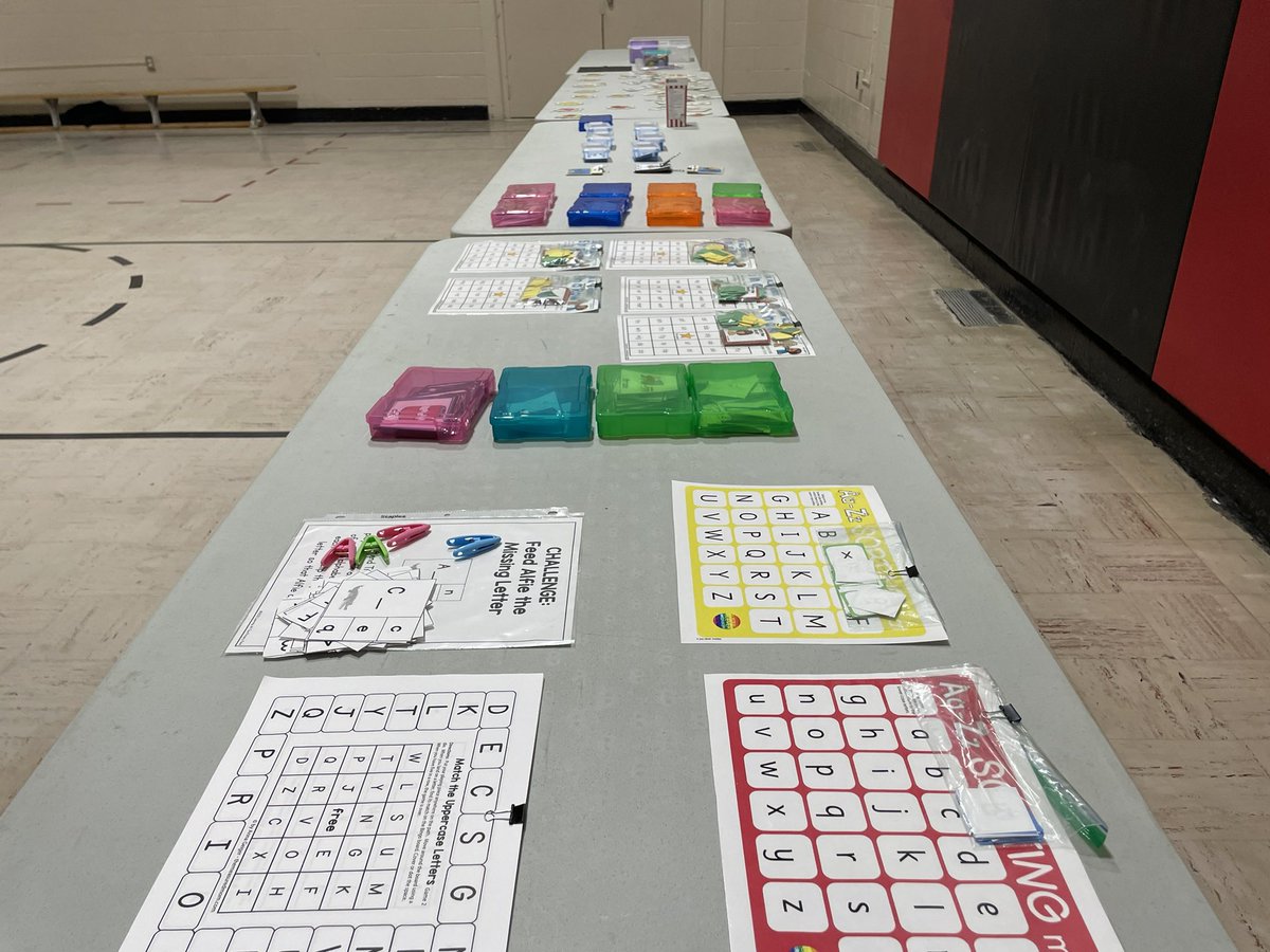 RoseComSchool's tweet photo. The gym is prepped for 3-way conferences. STEAM stations for families to try, @ruthmbuckschool donated shoes for families to take home, and our R.I.C. Teacher has a table to make DIY reading games and tips for parents! @RegPublicSchool https://t.co/P8bW3qhNH9