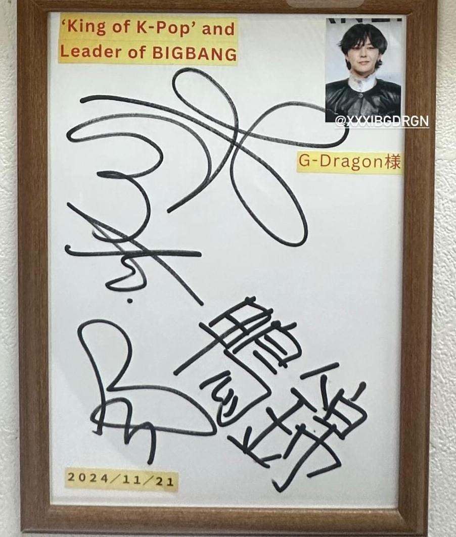 the GD udon restaurant got GD signature into a frame and let