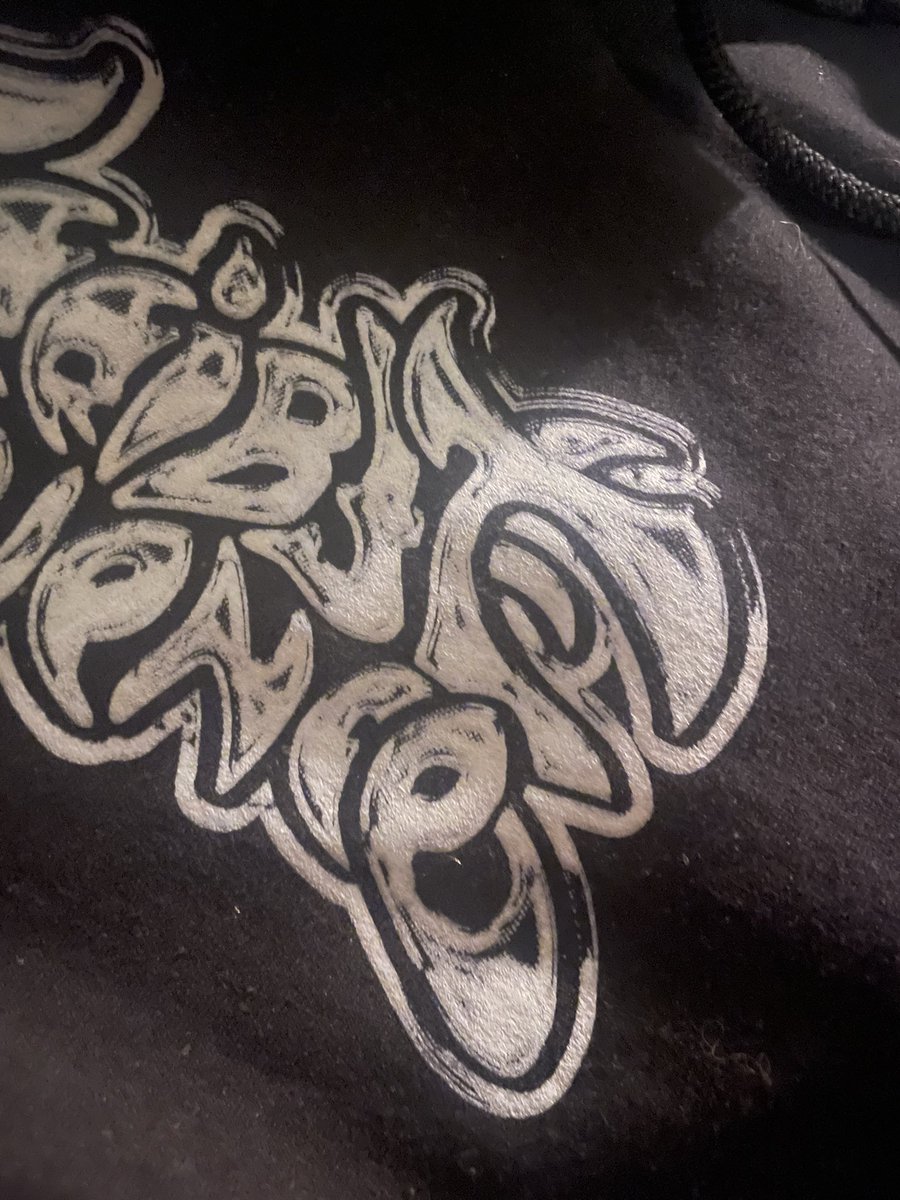 Dorianmice's tweet photo. @jkesbian @GreenTealBlue The first picture is the print from the EU manufacturer (also turning yellow?) and the second is from the US manufacturer. Similar problems could be seen with the satanic tee https://t.co/goBVbhGDpS