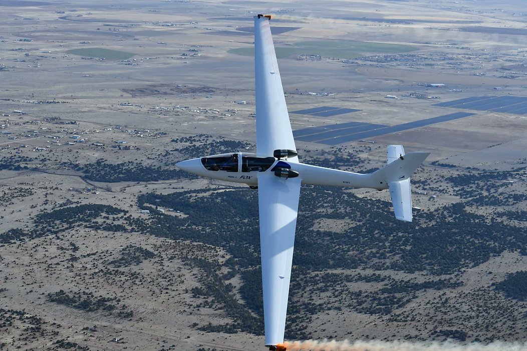 Ladies and gentlemen, we’ve got Bob Carlton of Vertigo Airshows! Bob will be flying his FoxJet Sailplane, which has two PBS TJ-100 jet engines. So, get ready because his performance won't be your typical sailplane performance!