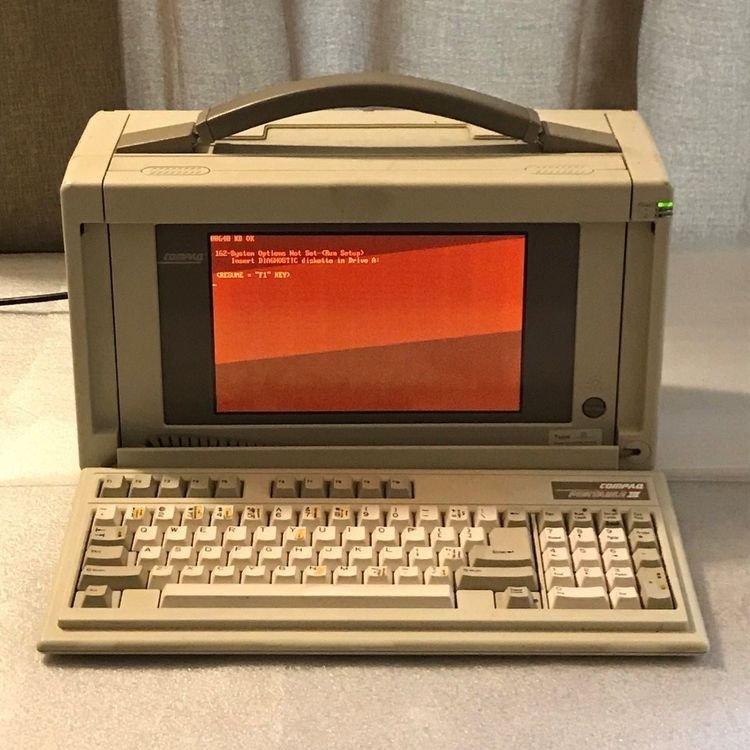 This is hilarious.

Compaq "Luggable" Portable Computer, blue-light free computer, circa late 1980s.