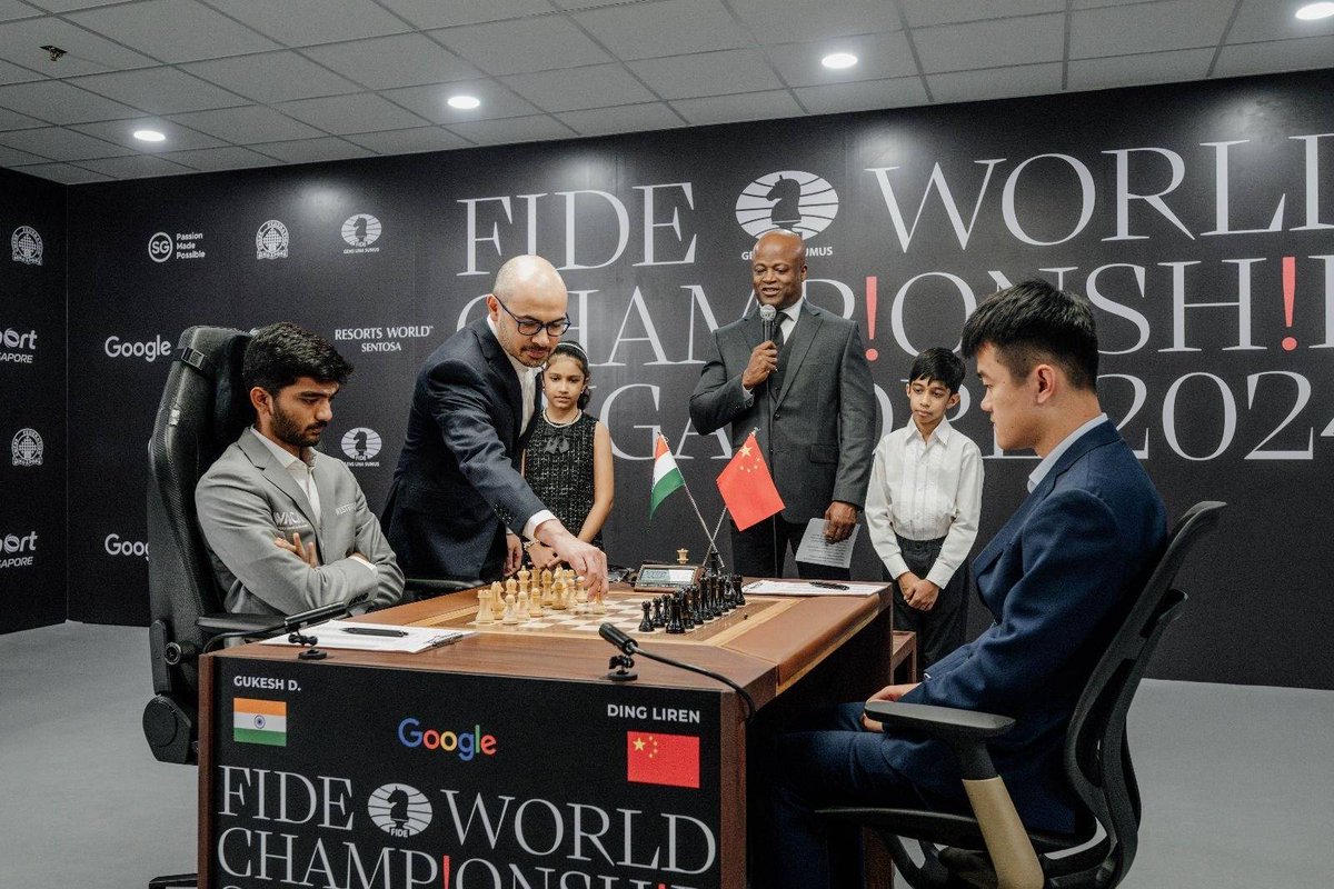 demishassabis's tweet image. It was an honour to play the opening move for Game 1 of the World Chess Championship in Singapore, sponsored by @Google. Very exciting first game! Good luck to both Ding Liren and Gukesh Dommaraju for the rest of the match! #DingGukesh