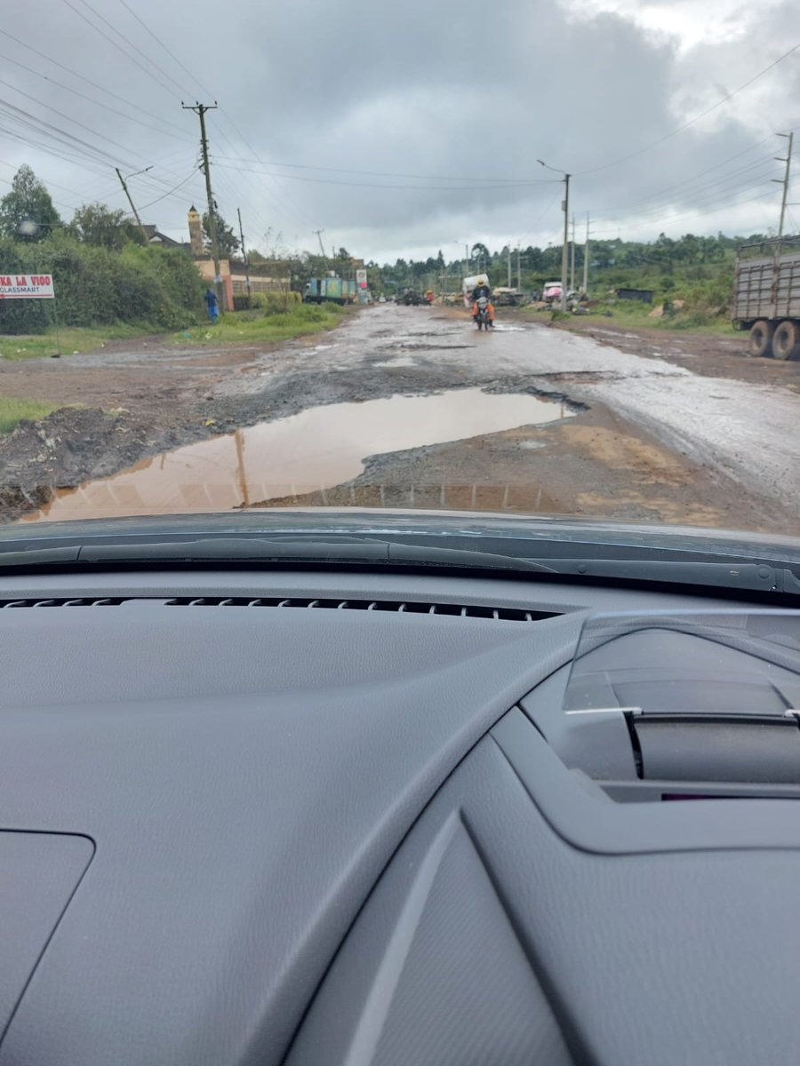 C_NyaKundiH's tweet photo. Residents of Ngong in Kajiado County are urgently appealing for government intervention as the Ngong-Kibiko-Suswa Road, particularly the 2.5km stretch between Ngong and Kibiko has deteriorated into an impassable state.

Repeated pleas to KERRA officials have reportedly gone unanswered, with some now questioning whether the officials are neglecting their duties or if there are deeper issues at play such as budget misappropriation.

Kajiado West MP George Sunkuiya is also accused of ignoring the worsening condition of the road, which many residents believe he frequently overlooks, possibly because he has access to fuel guzzlers that can navigate the rough terrain.

The road is vital for relieving pressure on the Maimahiu escarpment road, making it crucial for both the local community and commuters.

Kibiko town lies approximately 4.8 Kilometers southwest of Ngong town centre and is located along the Ngong-Suswa road.