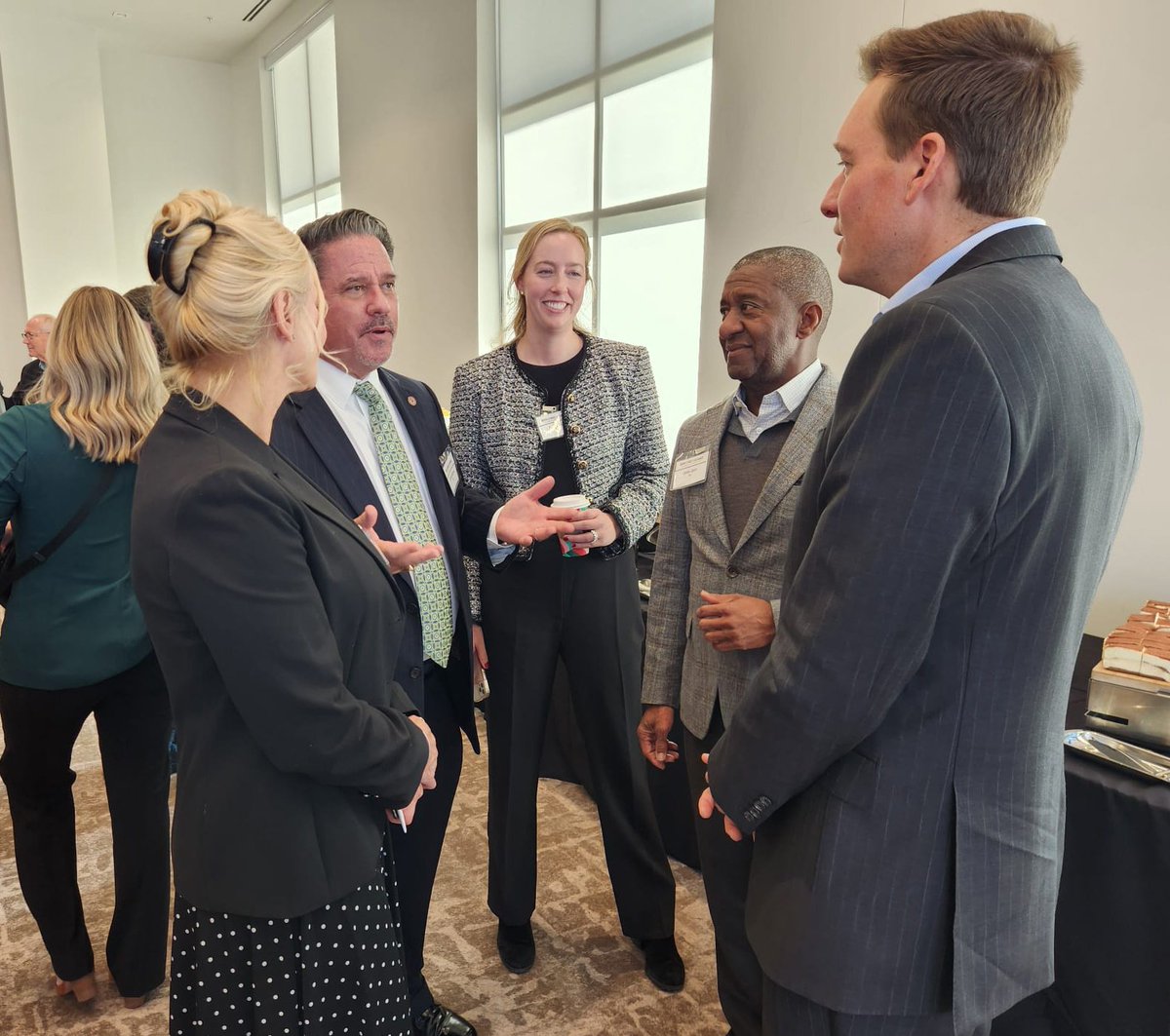 BSV's Oklahoma Entrepreneurial Technology Symposium was held at Norman’s NOUN Hotel on Friday. Shown below are (L to R) Elizabeth and Lawrence McKinney of NEDC,  CFO Kendall Tucker and General Partner James Spann of BSV, and Oklahoma Lt. Governor and keynote speaker Matt Pinnell.